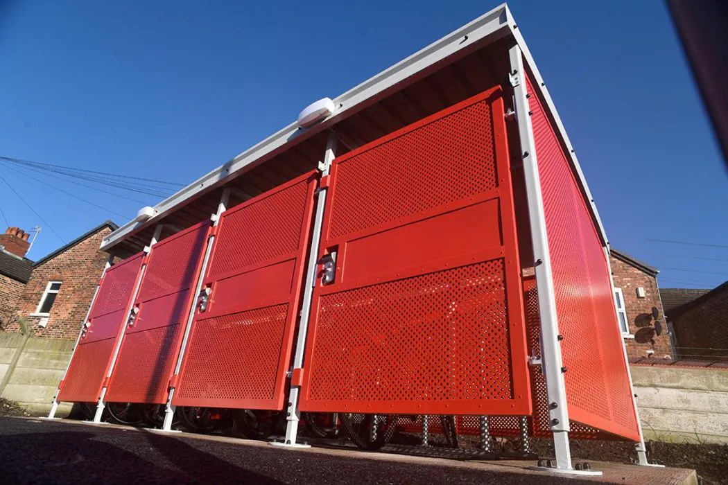 Red Cycle Parking Lockers at Royal Mail Delivery Office - Broxap