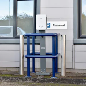 Access post and control barriers in car park setting
